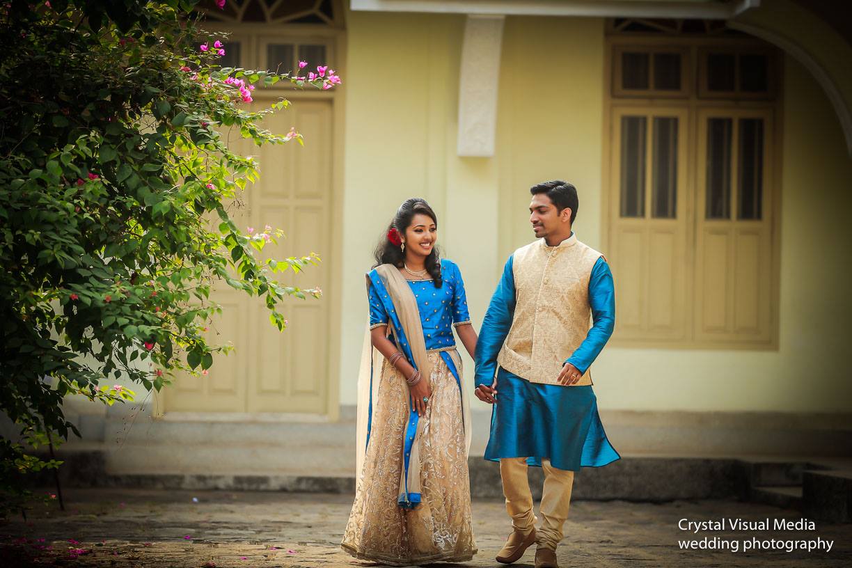 A scenic shot of Ashwini and Arun with the beautiful Cherai landscape in the background.