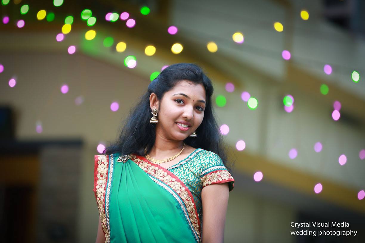 Candid wedding photography capturing a joyful moment between Ashwini and Arun after their engagement.