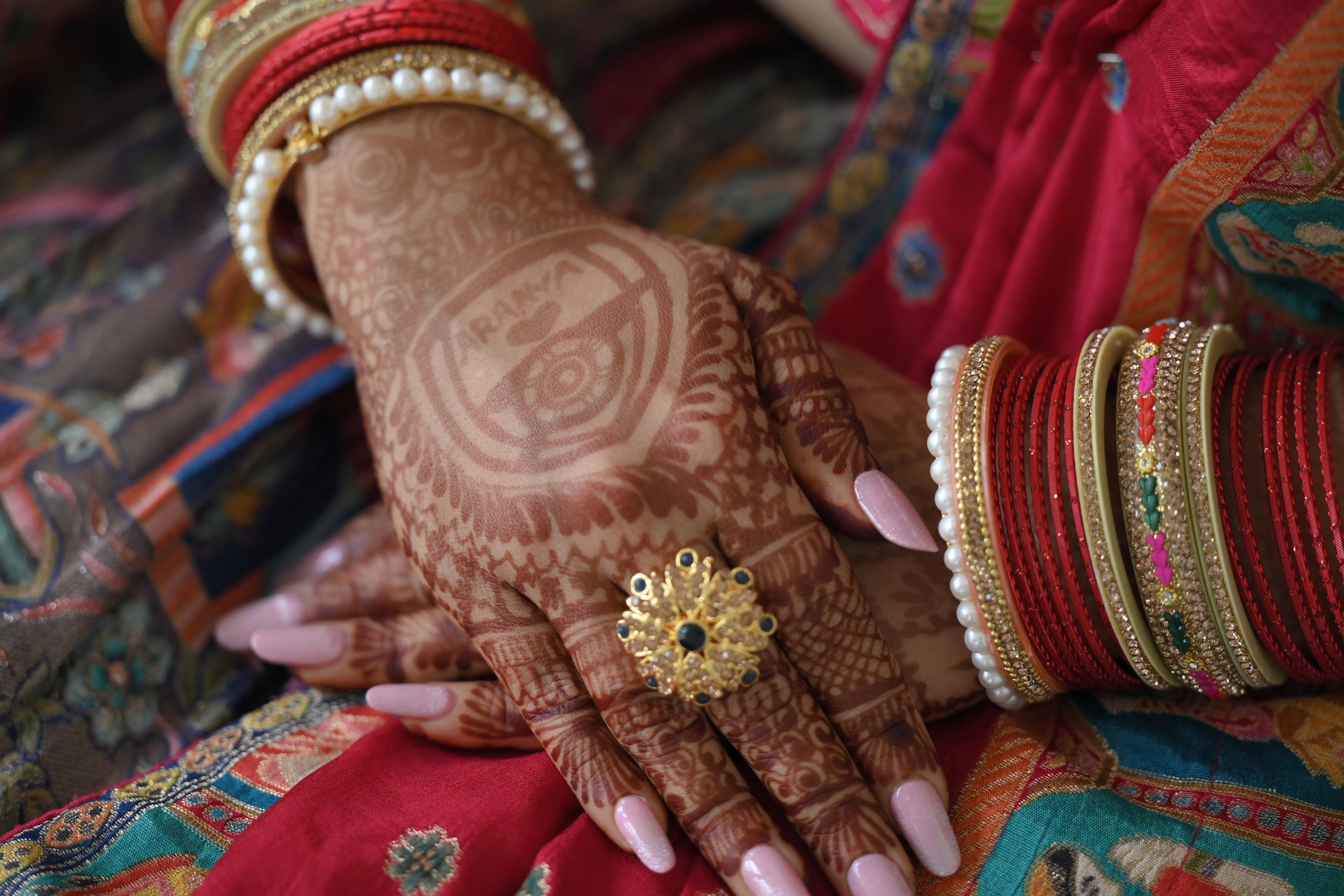 The bride's intricate mehndi design, a detail from the Mumbai wedding.