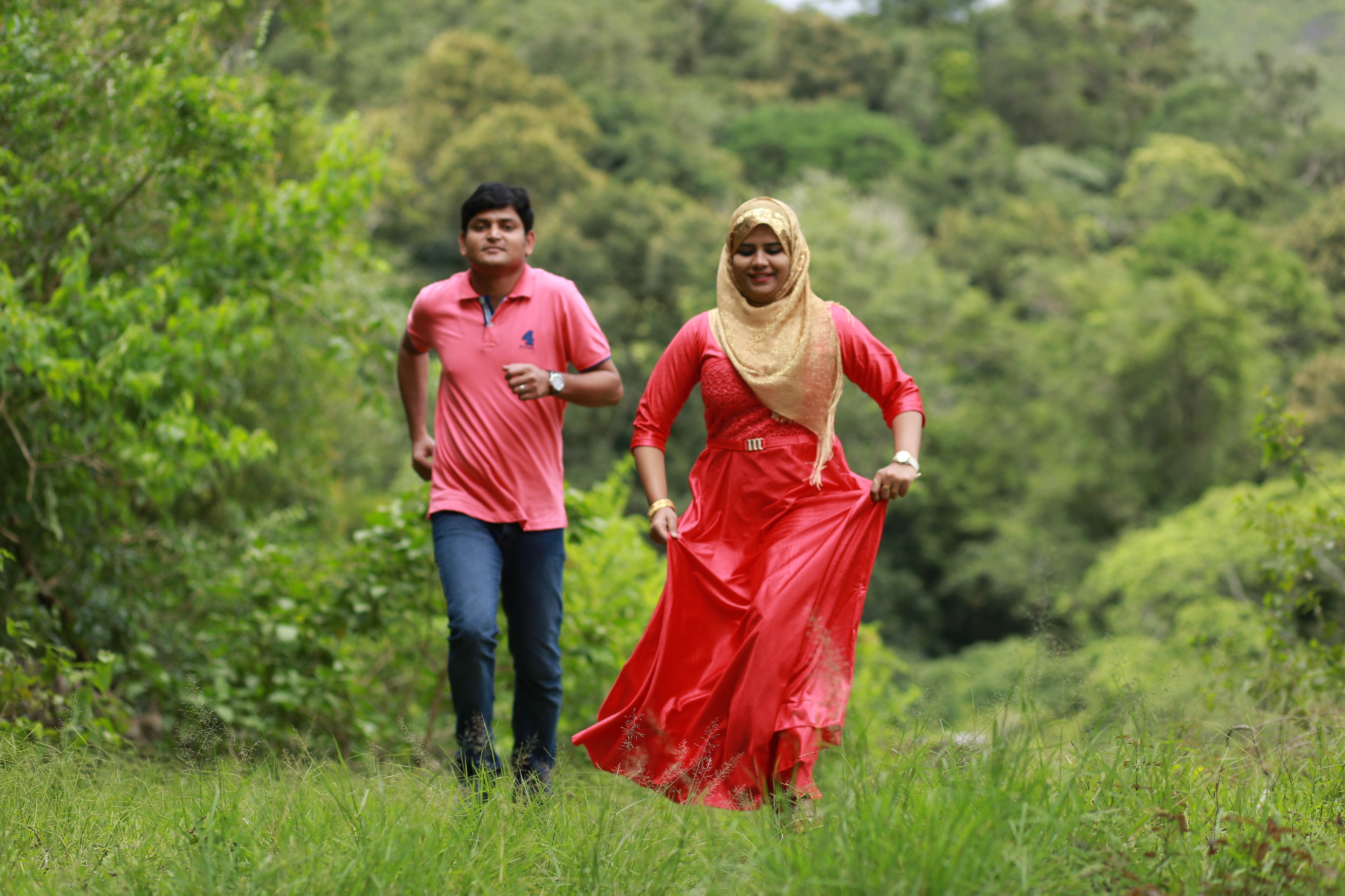 A classic pose of a bride and groom from their candid wedding photography in Kannur.